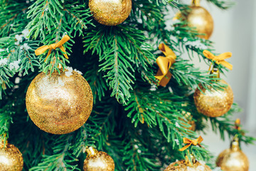 Wall Mural - Green fir tree with golden balls. Christmas wallpaper.