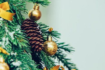 Wall Mural - Green fir tree with golden balls. Christmas wallpaper.