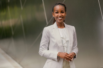 smiling cheerful charming friendly business woman, finance advisor, representative, corporate staff