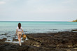 © allenkayaa - Young woman on the shore of a beautiful bay in Thailand, Koh Kood island