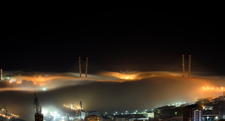 Fototapete - Vladivostok cityscape night view. Fog over the city.
