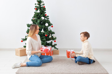 Wall Mural - Single parent and holidays concept - Portrait of mother celebrating christmas at home on christmas eve