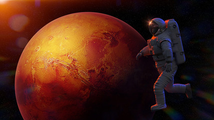 Wall Mural - astronaut during a space walk in orbit of planet mars