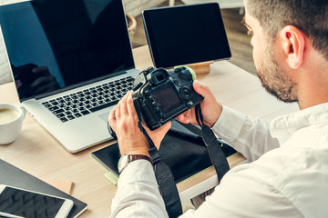 Wall Mural - Working table of a photographer close up