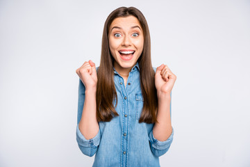 Close-up portrait of her she nice attractive lovely cute pretty glad excited cheerful cheery positive girl holding fists waiting gift isolated over light white color background