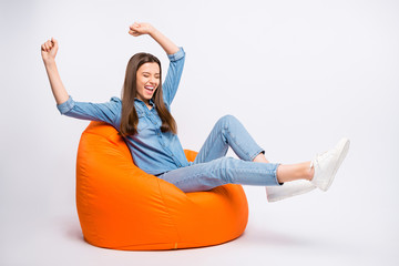 Wall Mural - profile side photo of delighted funky girl have rest sit big lounge armchair watch football world cu