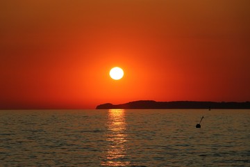 romantic sunrise on the quiet beach