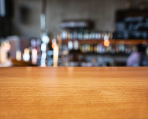 Wall Mural - Table top wooden Bar counter Beer tab restaurant Blur background