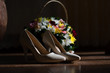 Wedding accessories: shoes, boutonniere and bride's bouquet