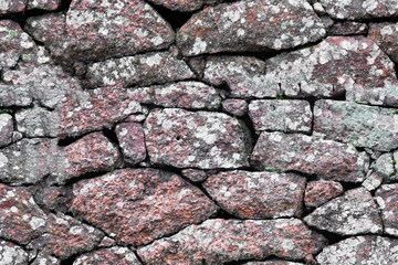 Poster - seamless texture. stone wall made of boulders of granite.
