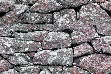 Wall Mural - seamless texture. stone wall made of boulders of granite.