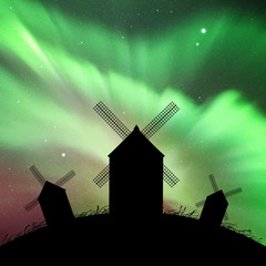 windmills in field at night. vector illustration with silhouettes of mills on hill. summer rural lan
