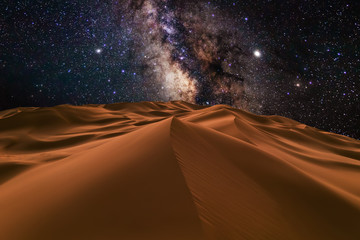 Amazing views of the Sahara desert under the night starry sky.