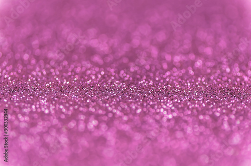 Obraz Dibond Abstract pink texture glitter lights background. de-focused.