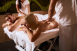 © alfa27 - Close up of young blonde girl lying on massage table, having hand massage from male professional masseur, looking away with calm face, enjoying together with boyfriend in spa salon