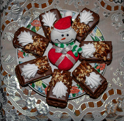 Christmas chocolate cake with nuts and meringue filling. Delicious and healthy dietary product.