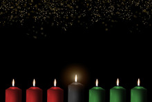 Kwanzaa For African-American Cultural Holiday Celebration With Candle Light Of Seven Candle Sticks In Black, Green, Red Symbolising 7 Principles Of African Heritage (Nguzo Saba)
