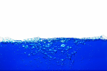 Close up blue Water splash with bubbles on white background