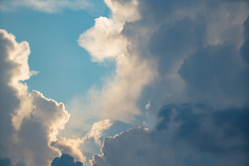 moody storm clouds on blue sky