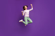 Full length body size view of her she nice lovely slim fit cheerful cheery girl jumping celebrating attainment having fun isolated on bright vivid shine vibrant purple violet lilac color background