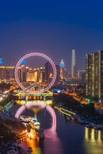 A Close-up Of Ferris Wheel At Night In Tianjin, China