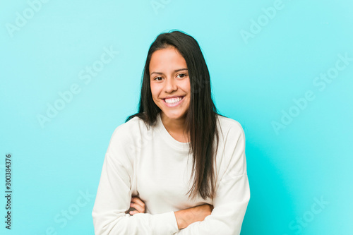 Photographie Young pretty hispanic woman laughing and having fun.