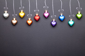 Wall Mural - christmas balls baubles hanging on blackboard background