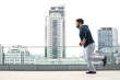 © New Africa - Young overweight man running outdoors. Fitness lifestyle