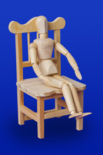 Wooden Toy Figure On Chair - Blue