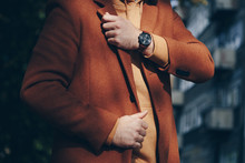 Street Style 2019 Fashion, Close Up Detail Of Men's Fashion Accessory. Man Checking The Time On His Leather Wrist Watch.