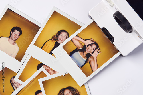 Cuadros en Lienzo Instant Film Photos Of Young Men And Women For Modeling Casting In Studio On Whi