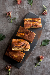 Wall Mural - Sliced banana pie decorated with chrysanthemum flowers