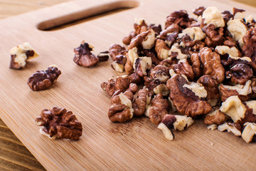 Poster - Walnut kernel in a white bowl