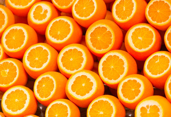 Abstract background with citrus-fruit of orange slices. Close-up