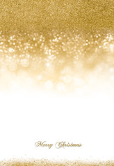 Wall Mural - christmas background with golden glitter scattered for a festive seasonal greeting