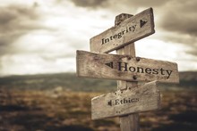 Integrity, Honesty And Ethics Signpost In Nature. Message, Quotes, Words, Meaning, Goals, Company, Business, Rules, Path Concept.