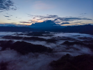 Canvas Print - Rural landscape with dramatic sea of cloud during sunrise with Mount Kinabalu at Saba, Borneo