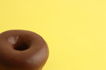 Poster - chocolate bagel on colorful background