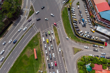 Wall Mural - Aerial Drone image of car moving on surrounding Residential area at Kota Kinabalu, Sabah, Malaysia