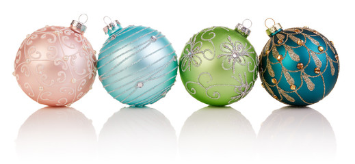 four colorful christmas balls on white background, xmas baubles