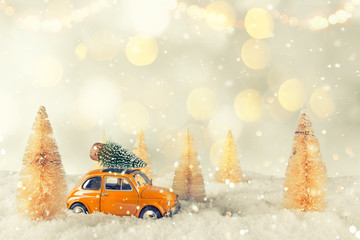 Wall Mural - christmas old car model with blurred background, lots of copy space for your product or text.