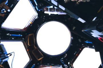 Wall Mural - view through the observation deck and window of the spacecraft with white spots on the glass place. 