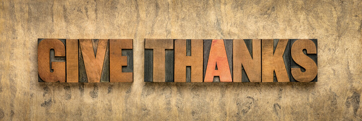 Wall Mural - give thanks - word abstract in wood type