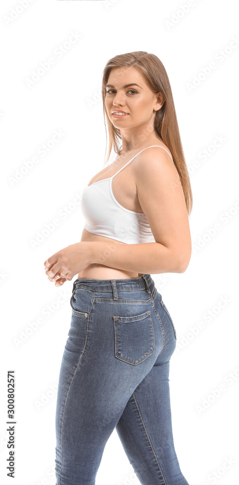 Young body positive woman on white background