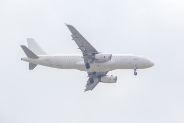 Unspecified white plane isolated on white background.