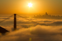 Spectacular Golden Gate Bridge Sunrise With Low Fog And City View