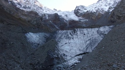 Canvas Print - Glacier in the mountains of the Caucasus. Shot on a drone