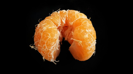 Orange fruit isolated on a black background with more freshness