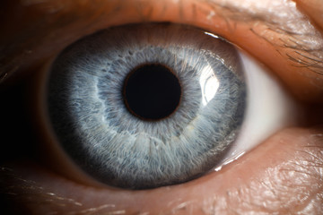 blue eye male human super macro closeup