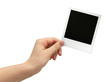 © lotus_studio - female hand holding polaroid frame on white background